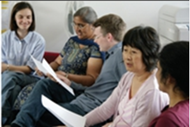 Group of people sitting on couch.